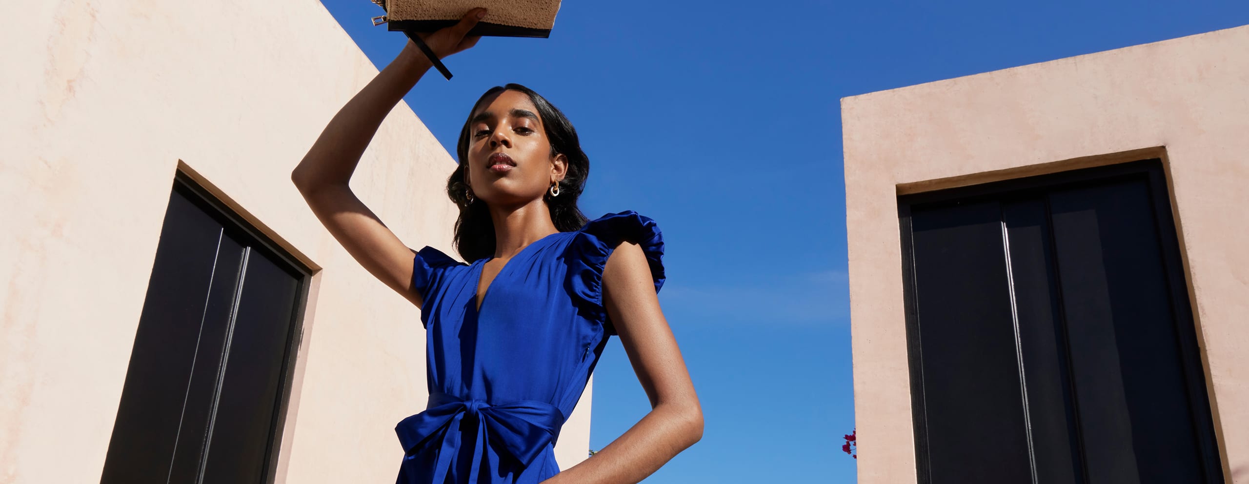 Model photographed in dress.