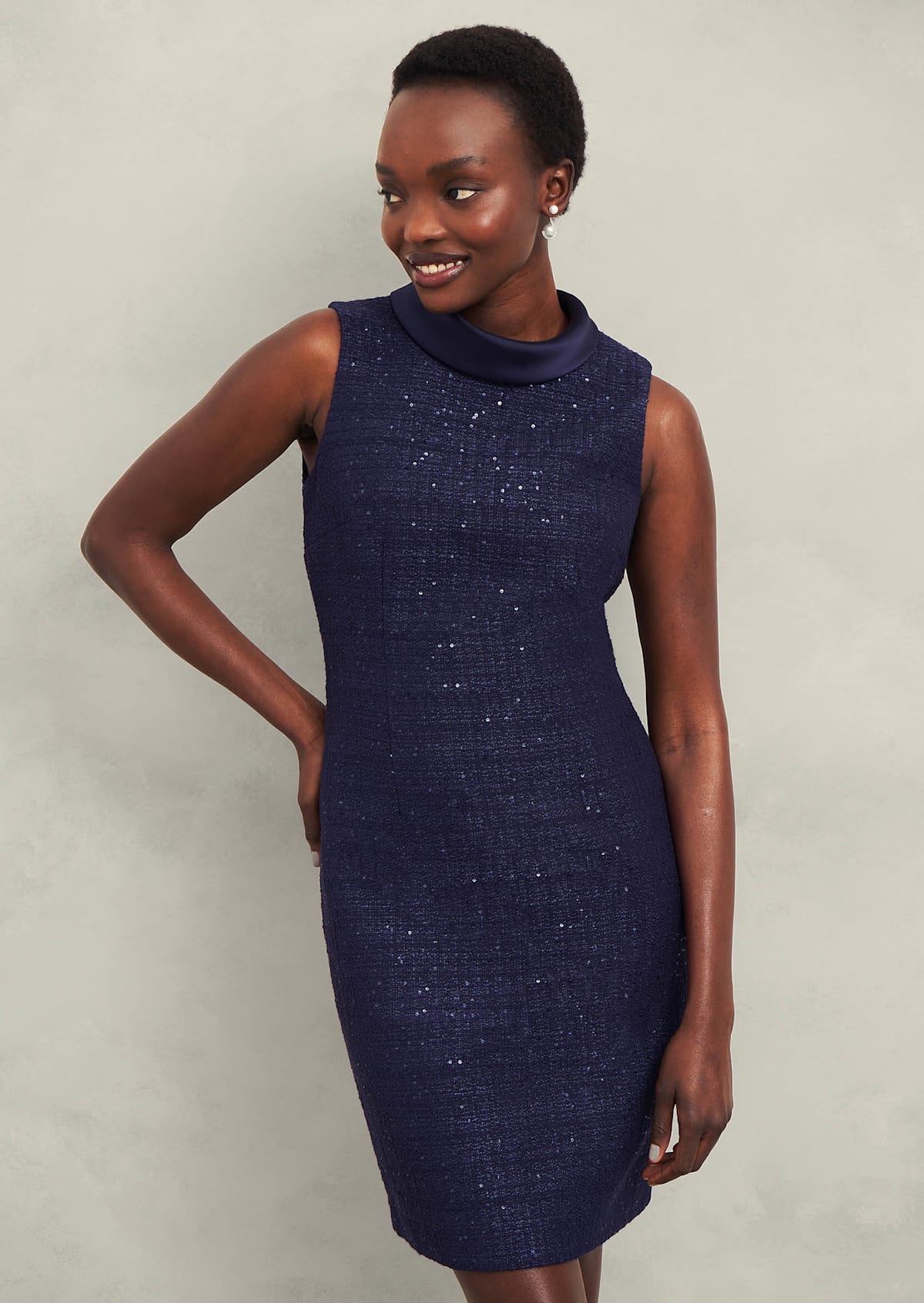 Gallery of two images of a model wearing a sequin coord.