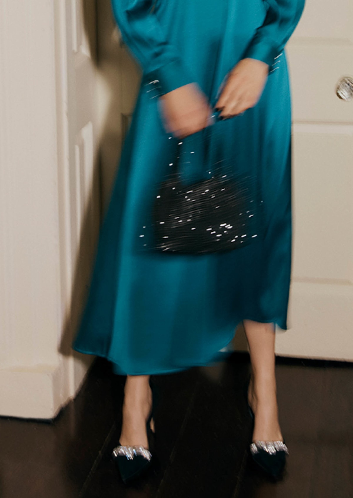 Gallery of two images of a model wearing a satin coord