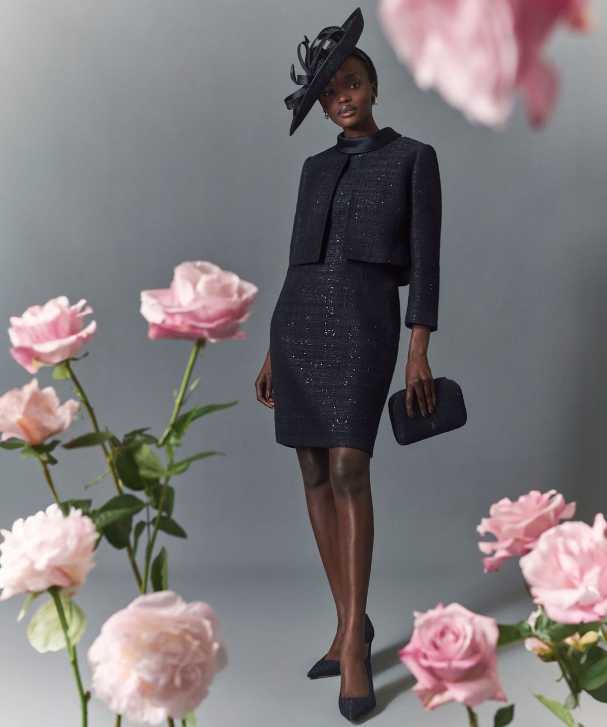 A gallery of images showing a model wearing a matching occasion dress and jacket.