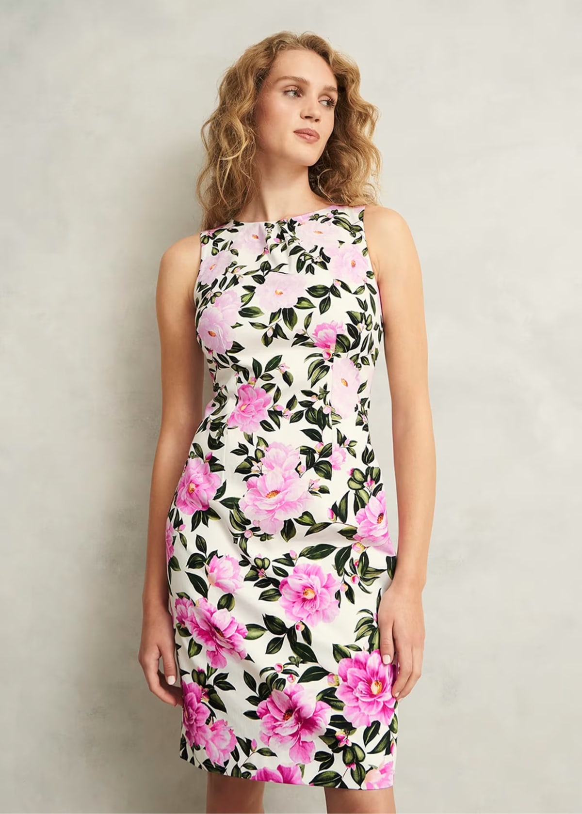 A collage of four images of models wearing floral occasion dresses from Hobbs.
