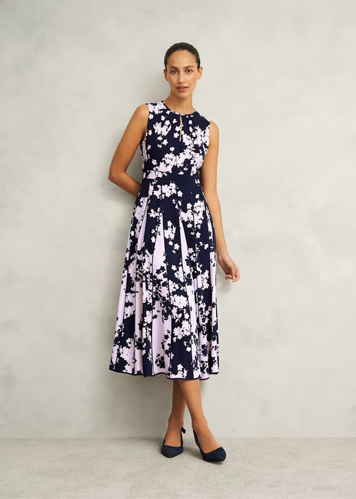 A collage of four images of models wearing floral occasion dresses from Hobbs.