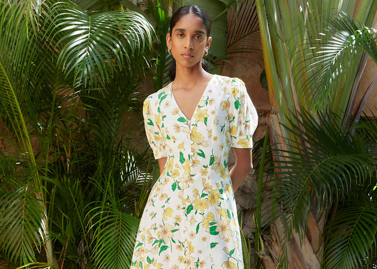 Model photographed in a floral dress.