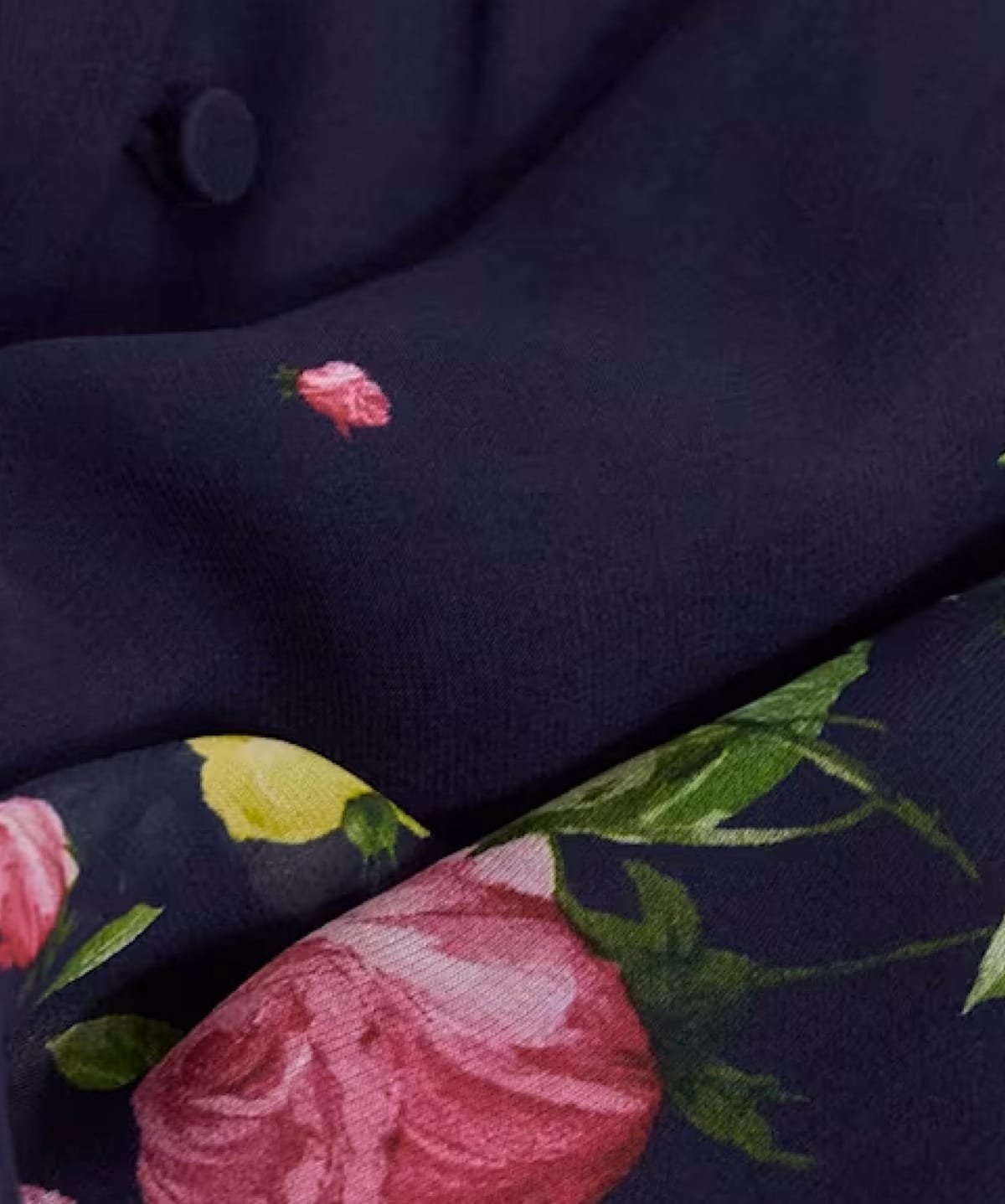  Image of model wearing a long sleeve floral midi dress and close-up of print.