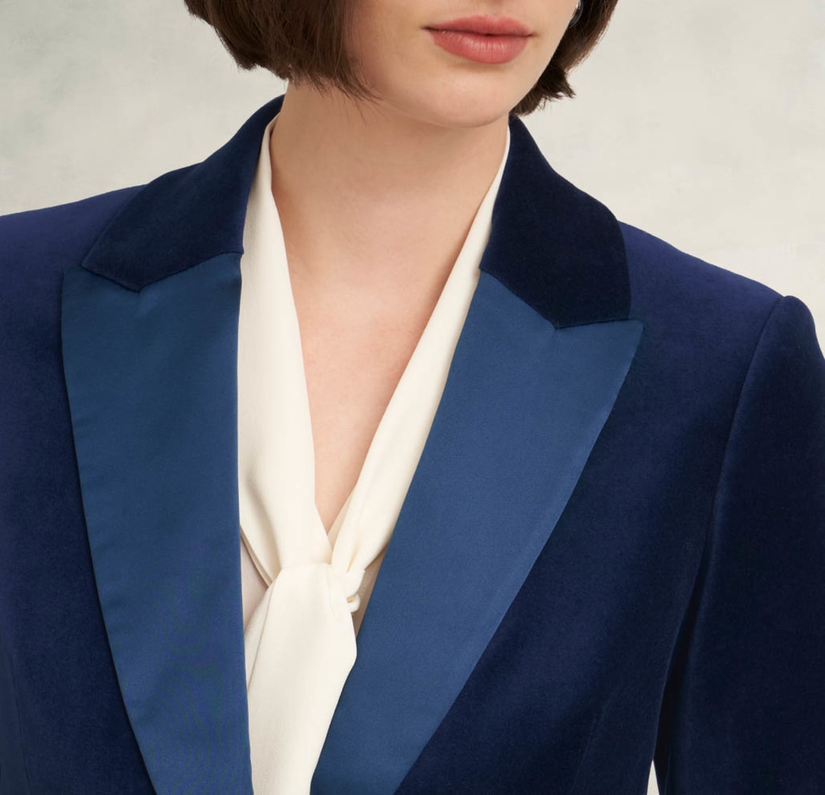 Gallery of two images of a model wearing a satin coord