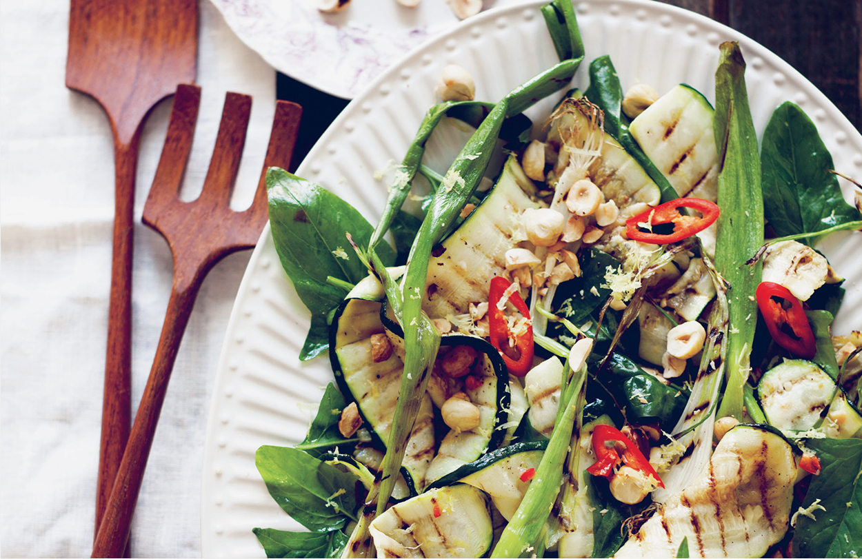 Sarah Britton's Grilled Courgette with Spring Onion and Hazelnut styled on a plate