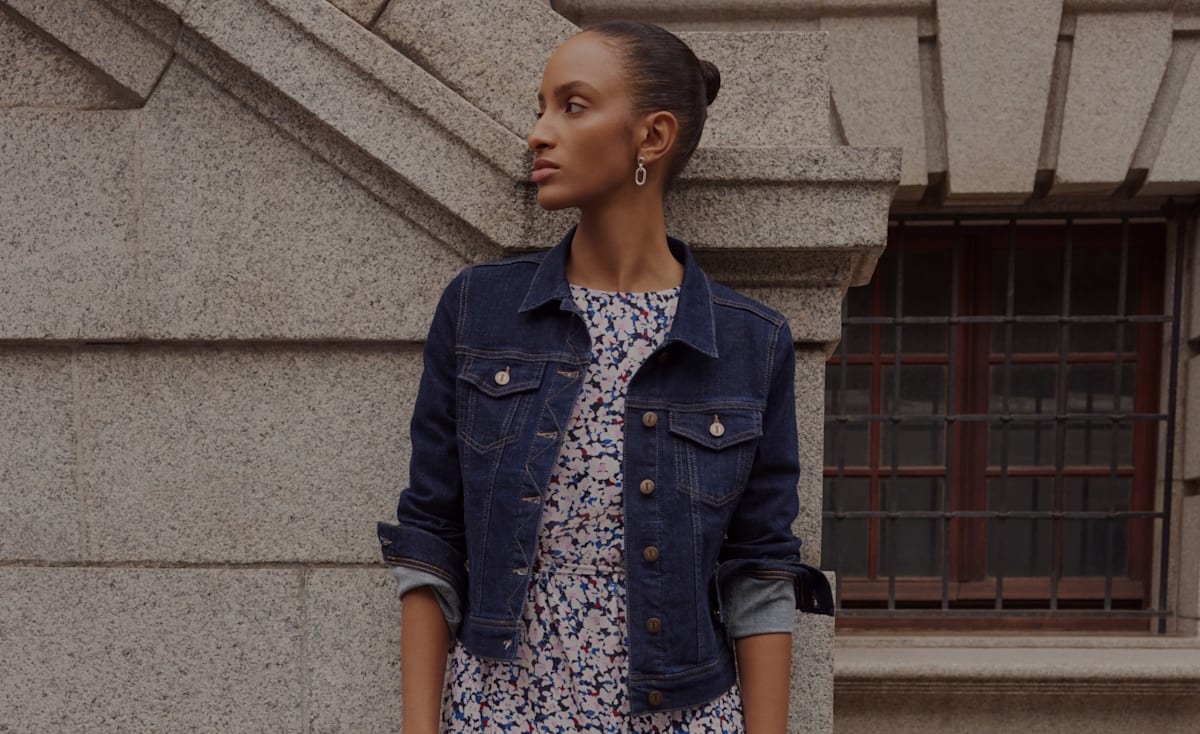 Gif of model wearing bootcut fit jeans with a puffer jacket
